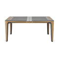 Moderne
eettafel met zwart gelegen tabletoppervlak en houten onderstel